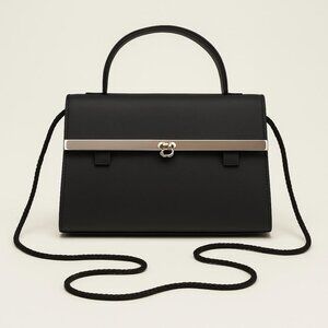Vintage Black Structured Handbag with Silver-Tone Bar Accent & Strap